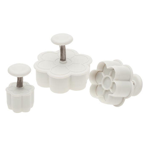 Set of three six-petal flower plunger cutters in different sizes with spring-action release, used for fondant or gum paste decorations